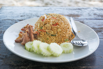 Rice topped with stir-fried pork and basil