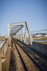 Fototapeta na wymiar Train Tracks on Bridge