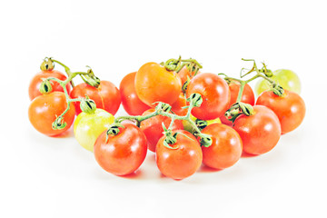 Fresh tomatoes isolated on white