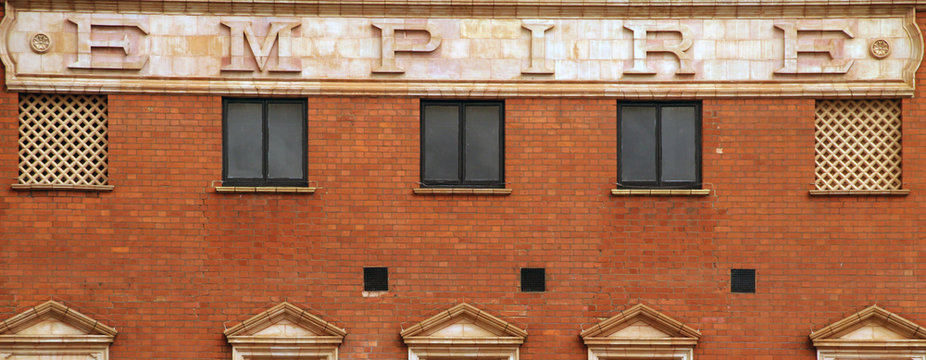 Facade of a brick classic building in central London, United Kingdom