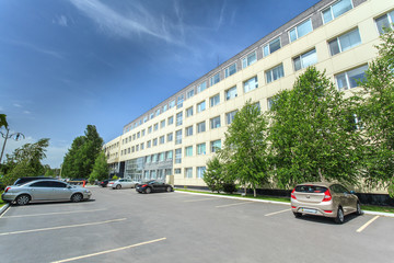 office building facade, parking
