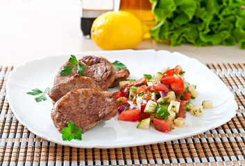 Pork medallions with salsa