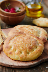 Homemade flat bread,olive oil and radishes