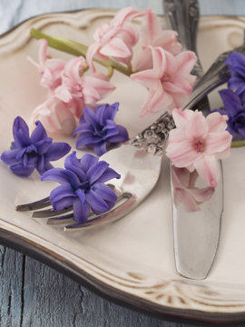 fork and knife with flowers, spring arrangement