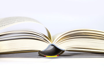 opened book on white background
