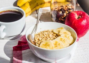 oatmeal with bananas, apples, nuts and dried fruit jar