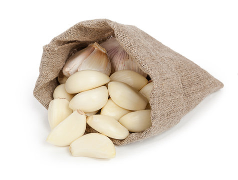 Garlic in bag isolated on white background