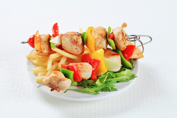 Chicken Shish kebabs with fries