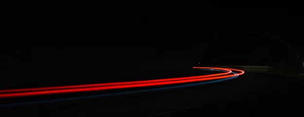 Photo sur Plexiglas Autoroute dans la nuit Car light trails in the tunnel.