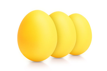 group of yellow eggs isolated on white