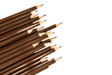 brown wooden pencil arrange on white background