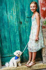 Lovely fashion girl with Maltese dog