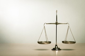 Justice. Law scales on table. Symbol of justice