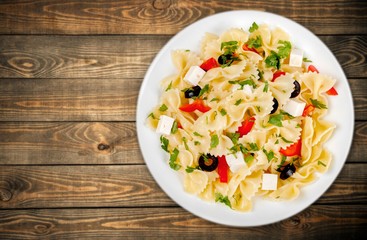 Broccoli. Pasta with broccoli and shrimp on a plate, top view