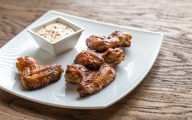 Baked chicken wings with spicy sauce