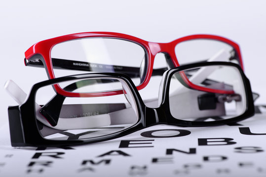 eyeglasses and eye chart