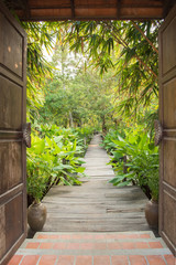 Fototapety  entrance gate to tropical garden