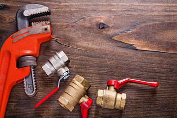 organized copyspace plumbers fixtures and monkey wrench on vinta