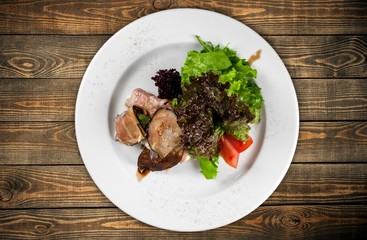 Meal. Overhead view of a plate of healthy grilled roast