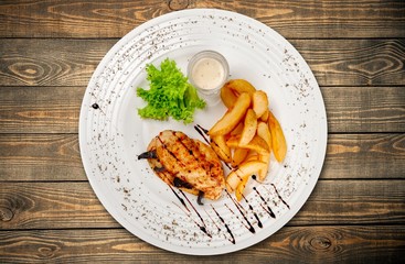Meal. Overhead view of a plate of healthy grilled roast