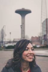 Beautiful girl posing in an urban context