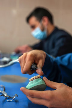 Dental technician in the technical laboratory