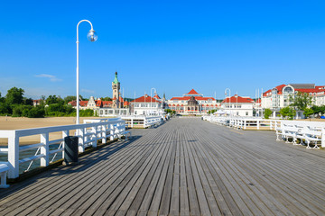 Wooden pier in Sopot seaside town in summer, Baltic Sea, Poland - obrazy, fototapety, plakaty