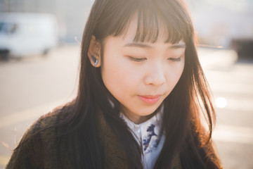 young beautiful asian hipster woman