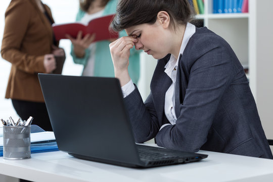 Female Clerk Having Sinus Pain