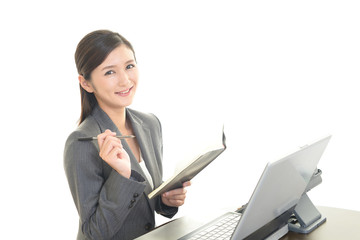 仕事中の笑顔のOL