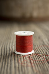 Red spool of thread