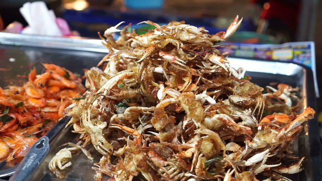 Fried insects such as grasshopper are typical Thai street food