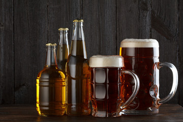 Beer glasses and bottles with variety of beer