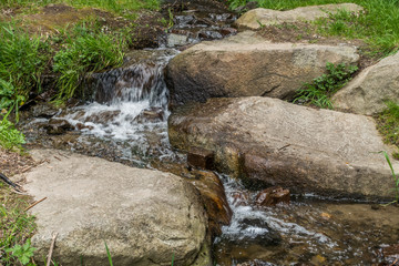 Stream Rushing Around Boulders