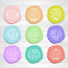 Set of retro badges with hand-drawn lettering on a wood