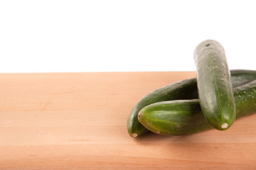 Cucumbers on wooden table