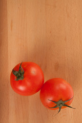 Two red tomatoes