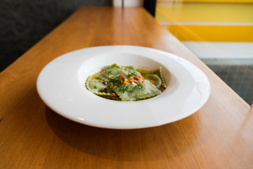 Ravioli pasta from green dough