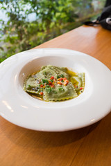 Ravioli pasta from green dough