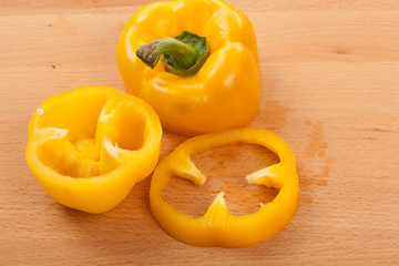 Cut yellow bell pepper on cutting board