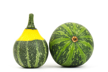 Raw pumpkins on white background