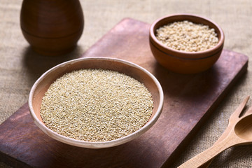 Raw white quinoa (lat. Chenopodium quinoa) grain seeds