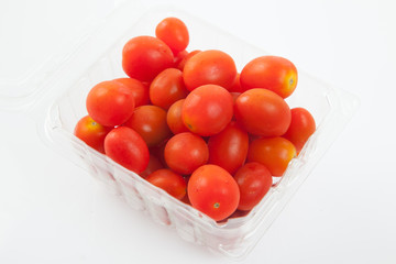 Red cherry tomatoes in a box
