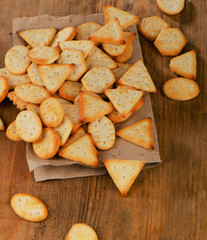 Crackers on a wooden background.