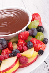 fruits and chocolate sauce