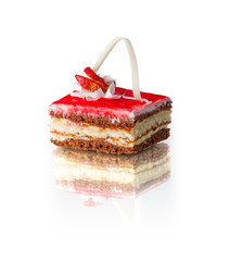 Rectangular piece of layered cake with strawberry