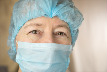 Smiling female doctor in hospital hallway