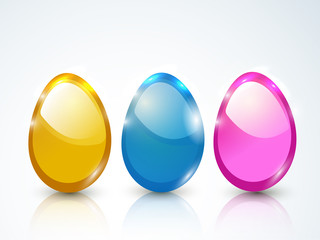 Glossy colorful Easter Eggs on shiny grey background.