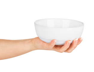 Hand holding an empty bowl on a white background