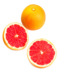Ripe grapefruits with slice isolated on white background close u
